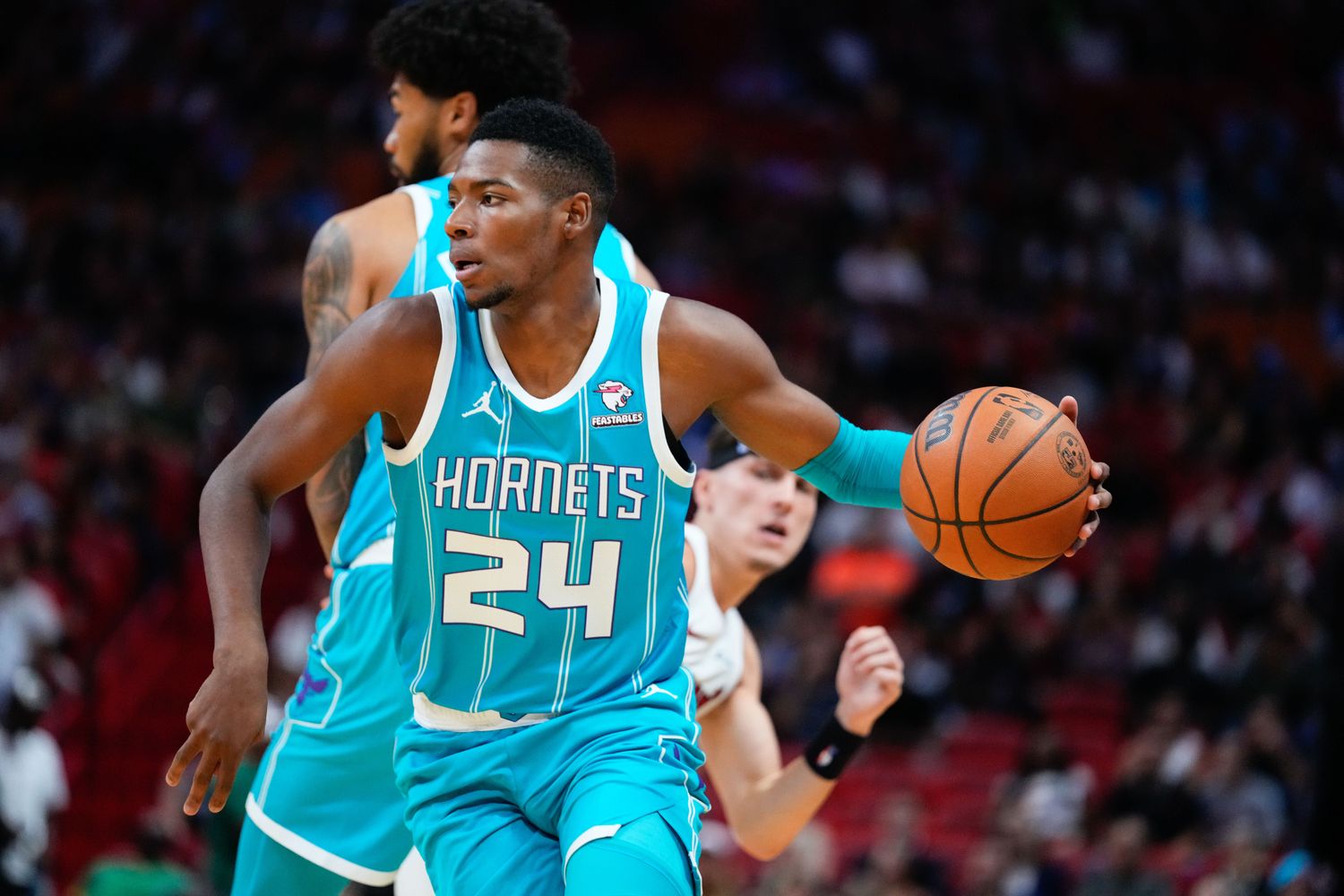 Oct 10, 2023; Miami, Florida, USA; Charlotte Hornets forward Brandon Miller (24) dribbles the ball against the Miami Heat during the second quarter at Kaseya Center. Mandatory Credit: Rich Storry-USA TODAY Sports